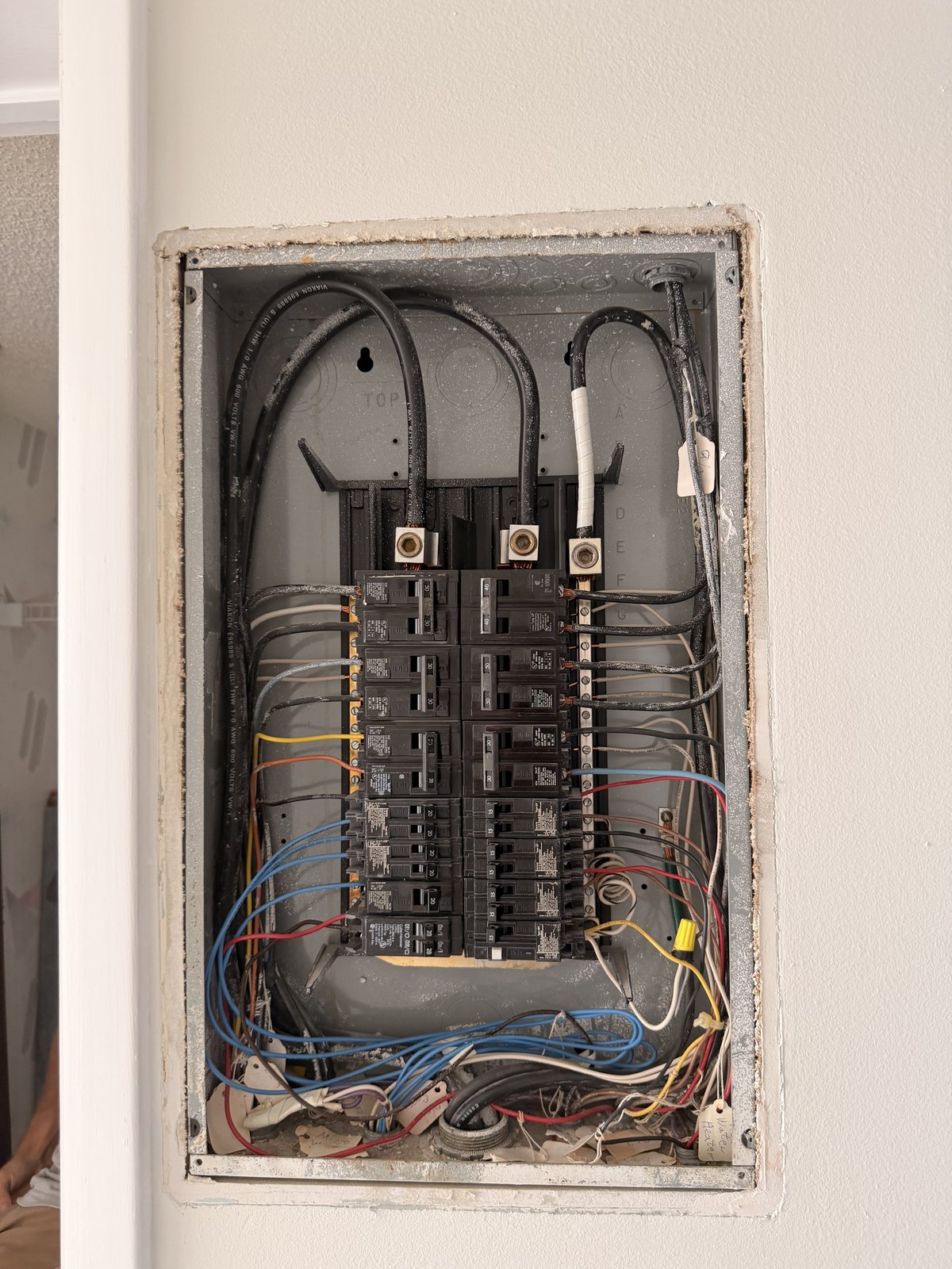 Interior breaker panel with the cover removed during electrical work